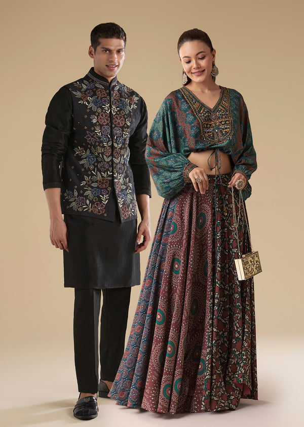 Indigo Noir Festive Couple Set – Indigo Printed Crop Top & Skirt Set for Her And Black Embroidered Silk Kurta Jacket Set for Him