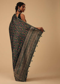 Botlle Green Saree In Muslin With Floral Print And Sequins On The Borders