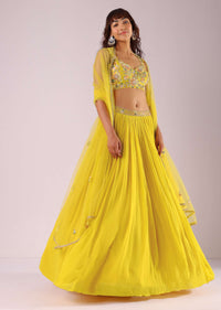 Sun Yellow Gathered Lehenga With Hand Embroidered Blouse Using Sequins And Cut Dana In Floral Motifs