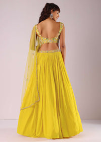 Sun Yellow Gathered Lehenga With Hand Embroidered Blouse Using Sequins And Cut Dana In Floral Motifs