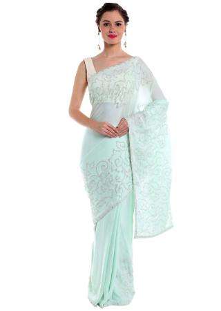 Ice blue satin saree studded with glittering kundan  only on Kalki