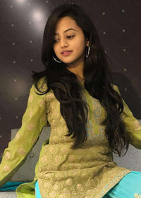 Helly Shah sharara suit thread work with contrasting pine green and arctic blue colors only on Kalki