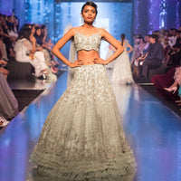 Aqua Blue Lehenga In Heavy Embroidered Net With Multi Layer Net Pleating At The Hem Online - Kalki Fashion