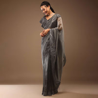 Steel Grey Tissue Organza Saree With Sequin Embroidery Blouse Crafted In Satin With A V Neckline