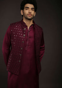 Wine Nehru Jacket Set In Raw Silk With Resham And Mirror Embroidered Geometric Jaal And Aligarh Pants