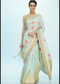 Pista green silk saree with multi color floral weaved work only on kalki