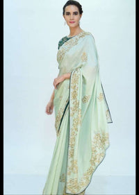 Pista green satin saree with emerald green silk blouse with cut dana embroidery only on kalki