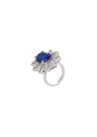 92.5 Sterling Silver Flower Shaped Ring Studded With Oval-Shaped Sapphire Blue Stone