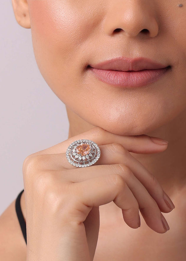 92.5 Sterling Silver In a Circular Design with Embedded Orange Diamond