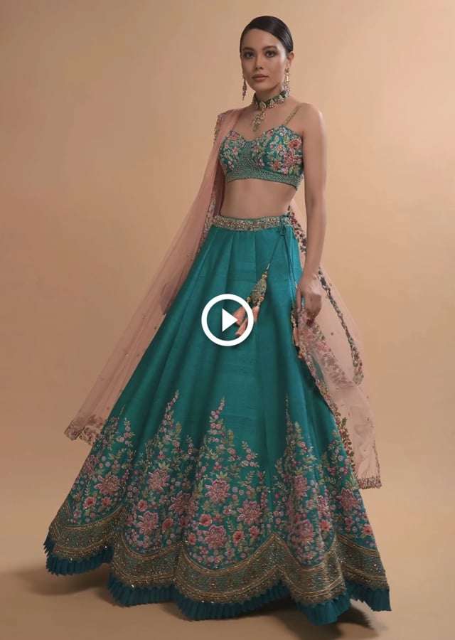 Ocean Green Lehenga Choli In Raw Silk With Resham Embroidered Spring Blooms And Scallop Hem