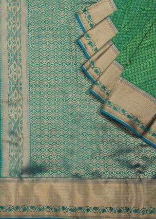 Pepper green saree with golden border only on Kalki