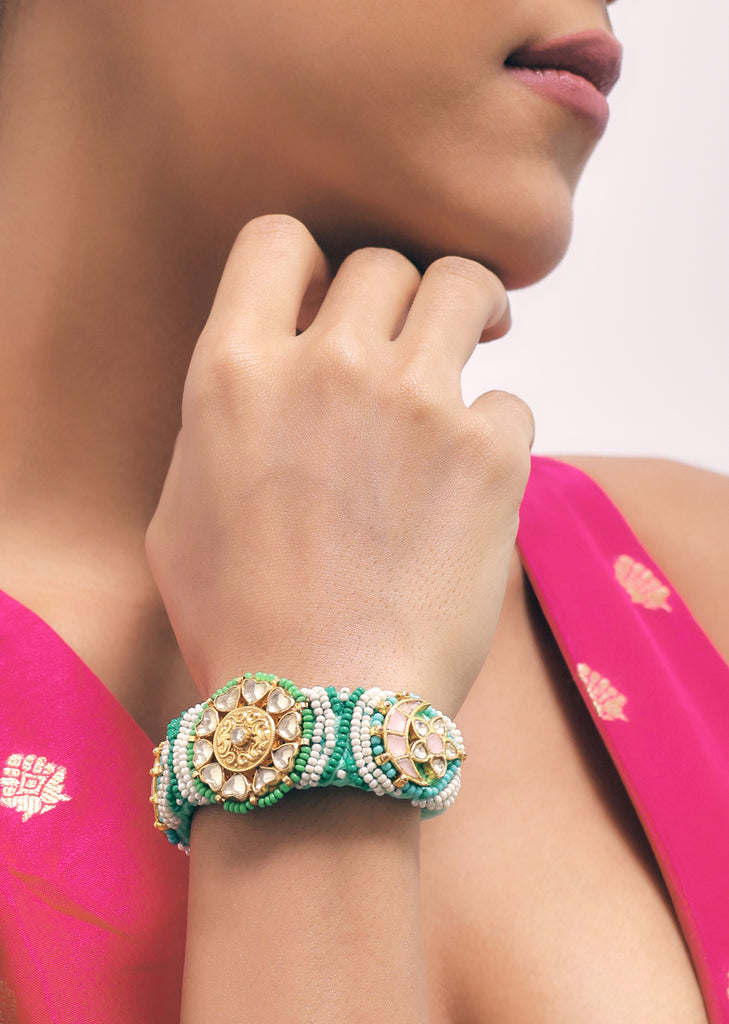 Gold Finish Pachi Kundan Bracelet With Emerald In A Mix Metal