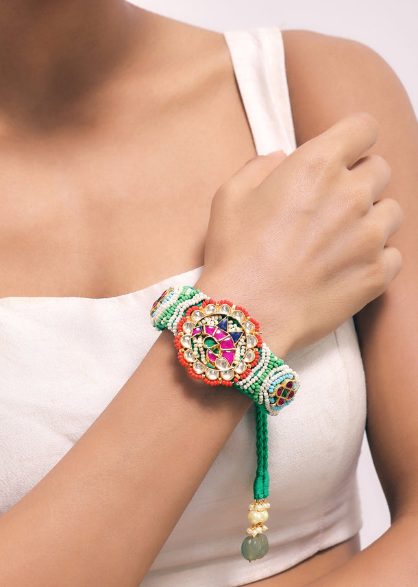 Gold Finish Pachi Kundan Bracelet With Emerald And Ruby In A Mix Metal