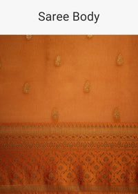 Orange Tissue Silk Saree With Zari Border And Butti Work