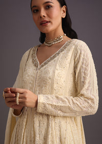 White Thread Work Kurti With Banarasi Weave Skirt And Butti Work Dupatta