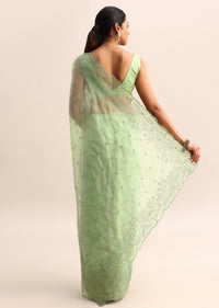 Green Organza Saree With Floral Thread Work Border And Unstitched Blouse