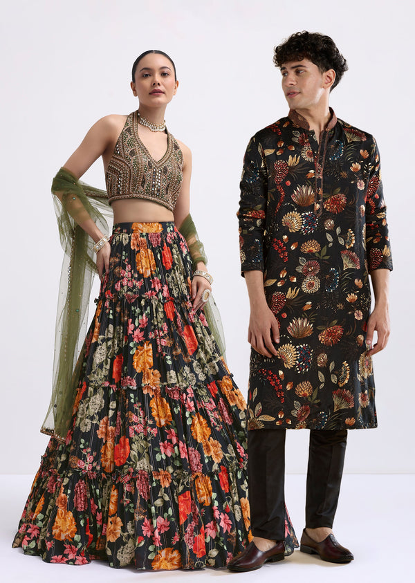 Timeless Floral Couple Set – Black Floral Printed Silk Lehenga Choli For Her And Black Silk Kurta Set With Resham Embroidery For Him