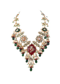 Gold Finish Kundan Necklace Set With Ruby And Emerald In Mix Metal