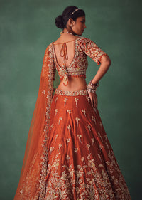 Rust Raw Silk Bridal Kali Lehenga With Embroidered Blouse And Dupatta