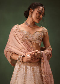 Peach Brocade Embroidered Bridal Lehenga With Two Dupattas