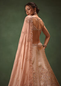 Peach Brocade Embroidered Bridal Lehenga With Two Dupattas