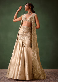 Gold Banarasi Embroidered Long Jacket With Sleeveless Blouse And Fishcut Lehenga