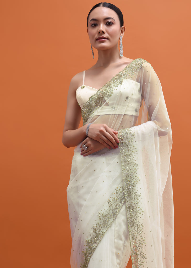 White Embroidered Net Saree With Unstitched Blouse