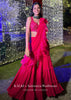 Hot Pink Crop Top Sharara Suit With An Attached Ruffle Draped And An Hand Embroidered Leaf Motifs