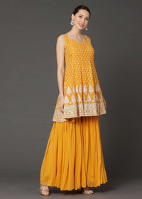 Amber Yellow peplum Suit In Georgette With Resham Work Buttis And Floral Pattern Online - Kalki Fashion