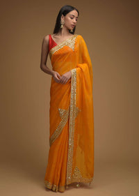 Amber Yellow Saree In Organza With Zari Woven Checks And Gotta Patti Work On The Border Along With Unstitched Blouse Online - Kalki Fashion