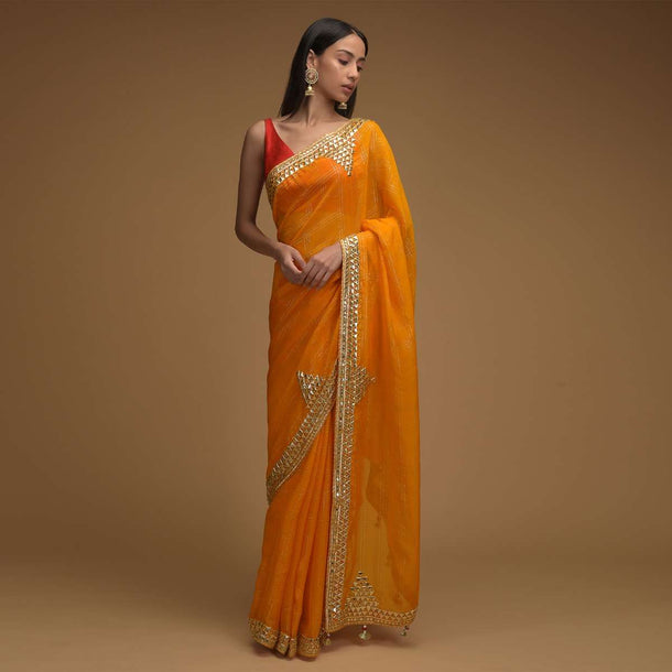 Amber Yellow Saree In Organza With Zari Woven Checks And Gotta Patti Work On The Border Along With Unstitched Blouse Online - Kalki Fashion