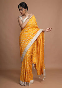 Amber Yellow Saree In Silk With Gotta Work Stripes And Border Online - Kalki Fashion