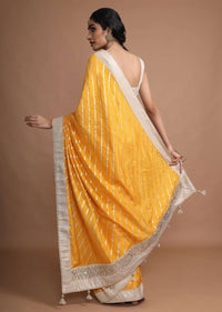 Amber Yellow Saree In Silk With Gotta Work Stripes And Border Online - Kalki Fashion