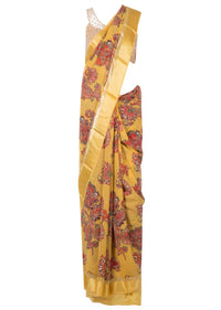 Amber yellow saree in satin with big floral print only on Kalki