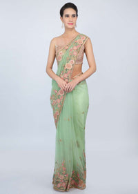 Apple green sheer net saree with floral  embroidered butti and border only on kalki