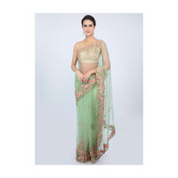 Apple green sheer net saree with floral  embroidered butti and border only on kalki