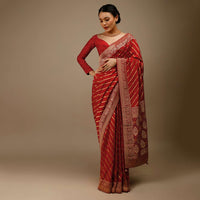 Apple Red Saree In Silk With Diagonal Stripes And Red Brocade Bandhani Pallu And Border Along With Unstitched Blouse
