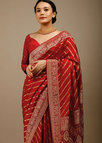 Apple Red Saree In Silk With Diagonal Stripes And Red Brocade Bandhani Pallu And Border Along With Unstitched Blouse