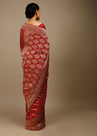 Apple Red Saree In Silk With Diagonal Stripes And Red Brocade Bandhani Pallu And Border Along With Unstitched Blouse