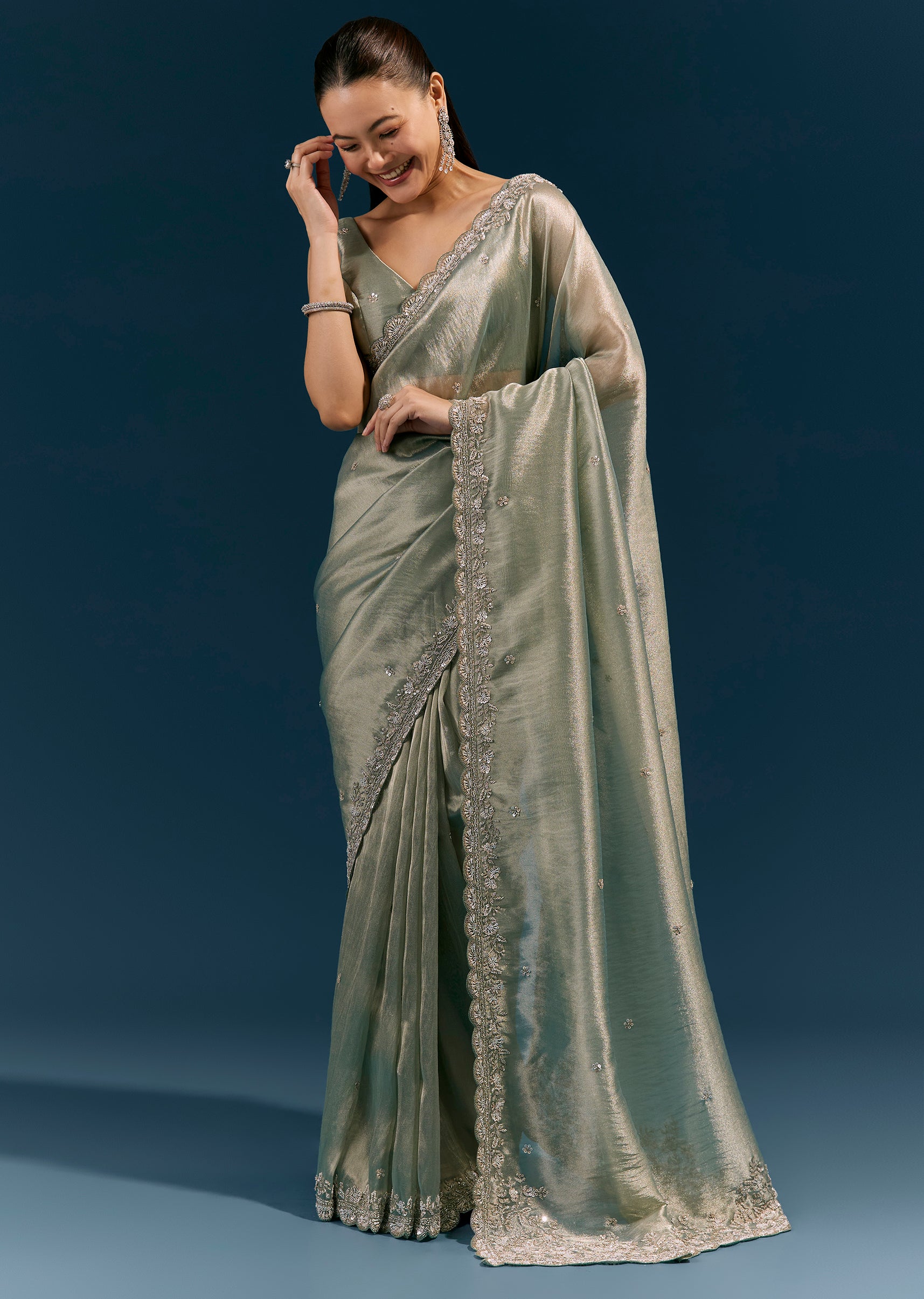 Aqua Blue Tissue Saree With Scalloped Hand Embroidered Border And Butti