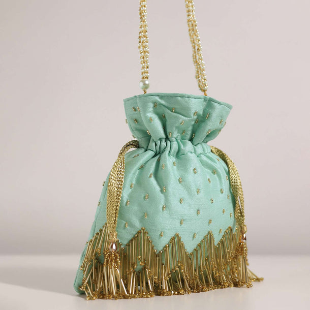 Aqua Blue Embroidered Potli Bag In Raw Silk With Tassels