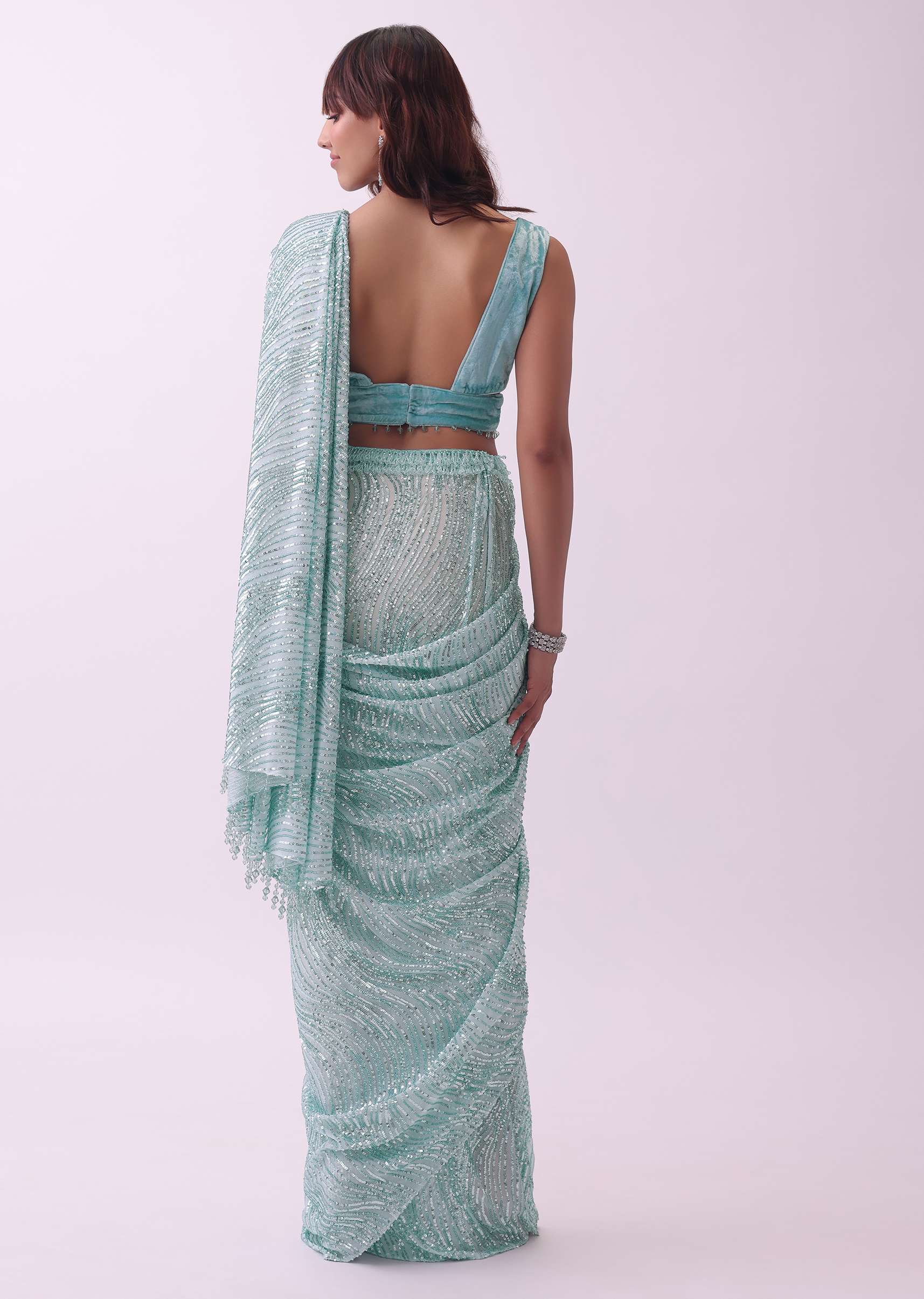 Aqua Blue Saree And Stitched Velvet Blouse With Hanging Crystals