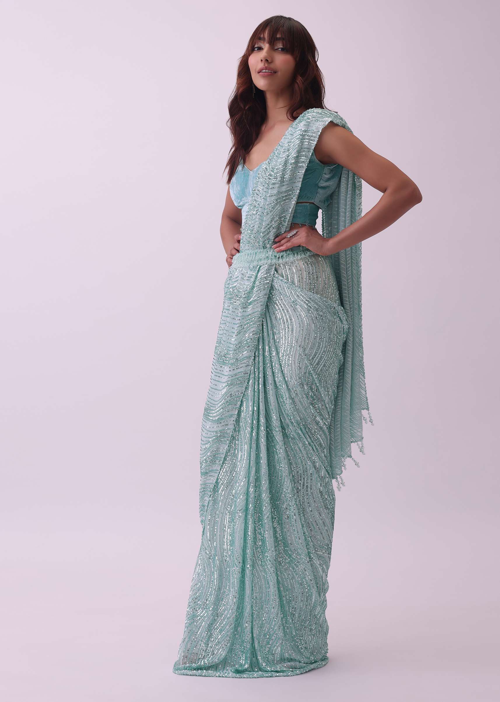 Aqua Blue Saree And Stitched Velvet Blouse With Hanging Crystals