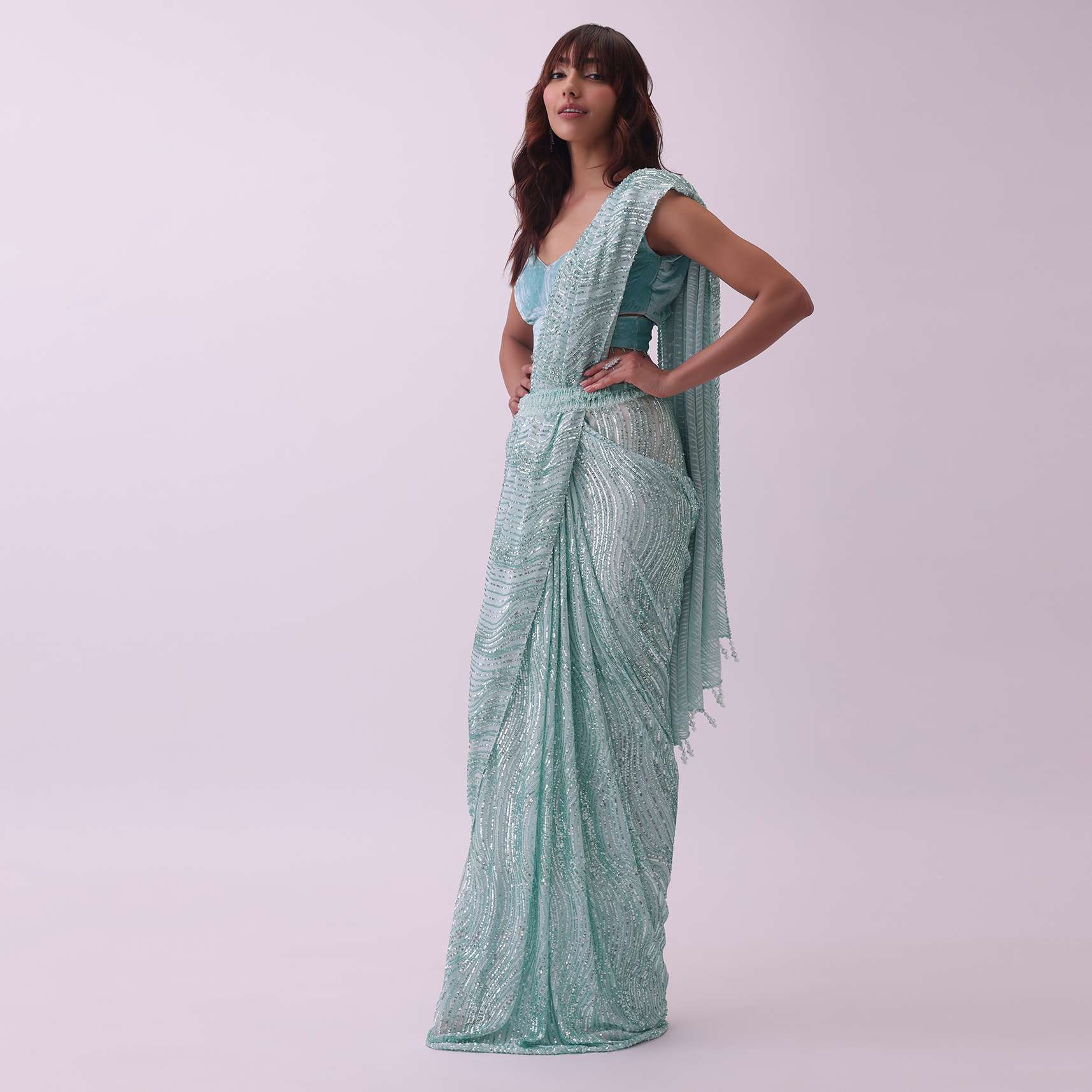 Aqua Blue Saree And Stitched Velvet Blouse With Hanging Crystals