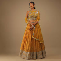 Arrowwood Yellow And Red Lehenga With A Crop Top In Digital Bandhani Print, Choli Comes In Multiple Tones Of Cut Dana And White Moti Embroidery Buttis