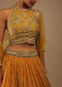 Arrowwood Yellow And Red Lehenga With A Crop Top In Digital Bandhani Print, Choli Comes In Multiple Tones Of Cut Dana And White Moti Embroidery Buttis