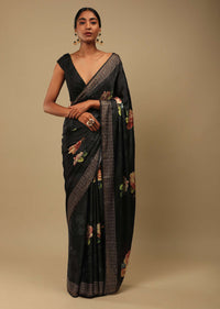 Ash Black Saree In Satin Crepe With Rose Print And Kundan Detailed Border Along With Unstitched Blouse