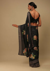 Ash Black Saree In Satin Crepe With Rose Print And Kundan Detailed Border Along With Unstitched Blouse