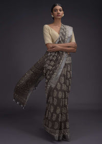 Ash Grey Saree In Linen With Batik Printed Buttis And Zari Weaved Border Online - Kalki Fashion