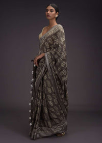 Ash Grey Saree In Linen With Batik Printed Buttis And Zari Weaved Border Online - Kalki Fashion